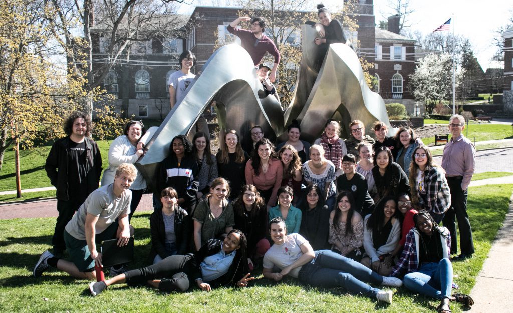 Music students gathered in front of the Light Fine Arts building.
