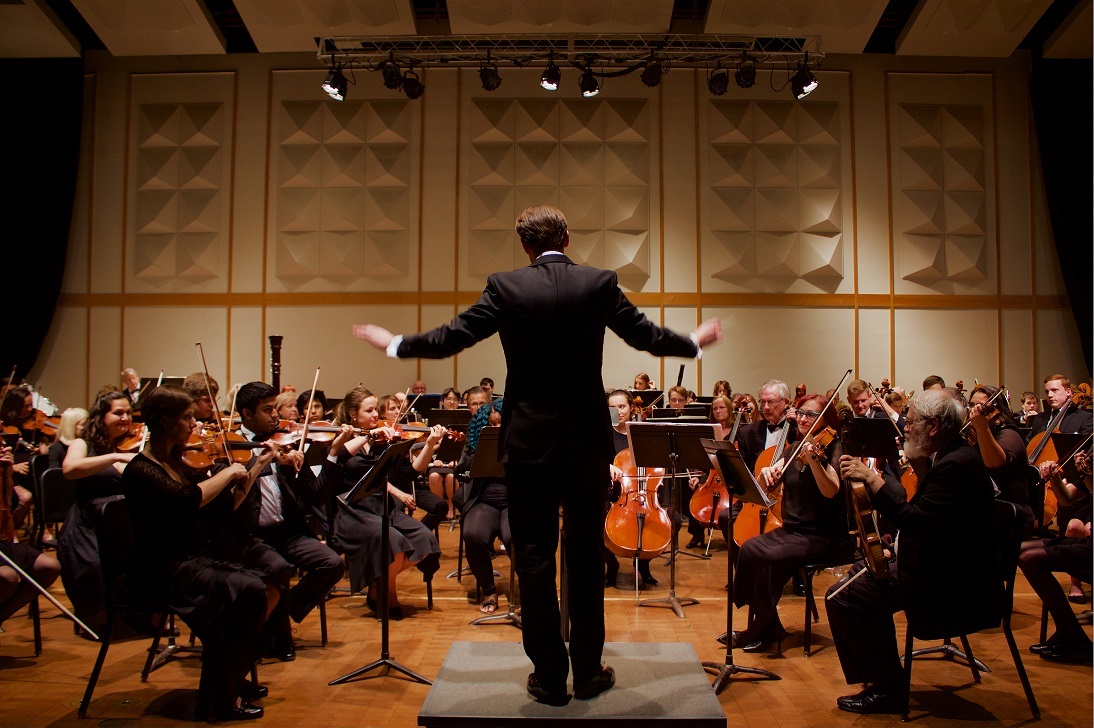 Andrew Koehler conducting the Kalamazoo Philharmonia performing.